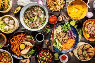 A display of Asian food in bowls.